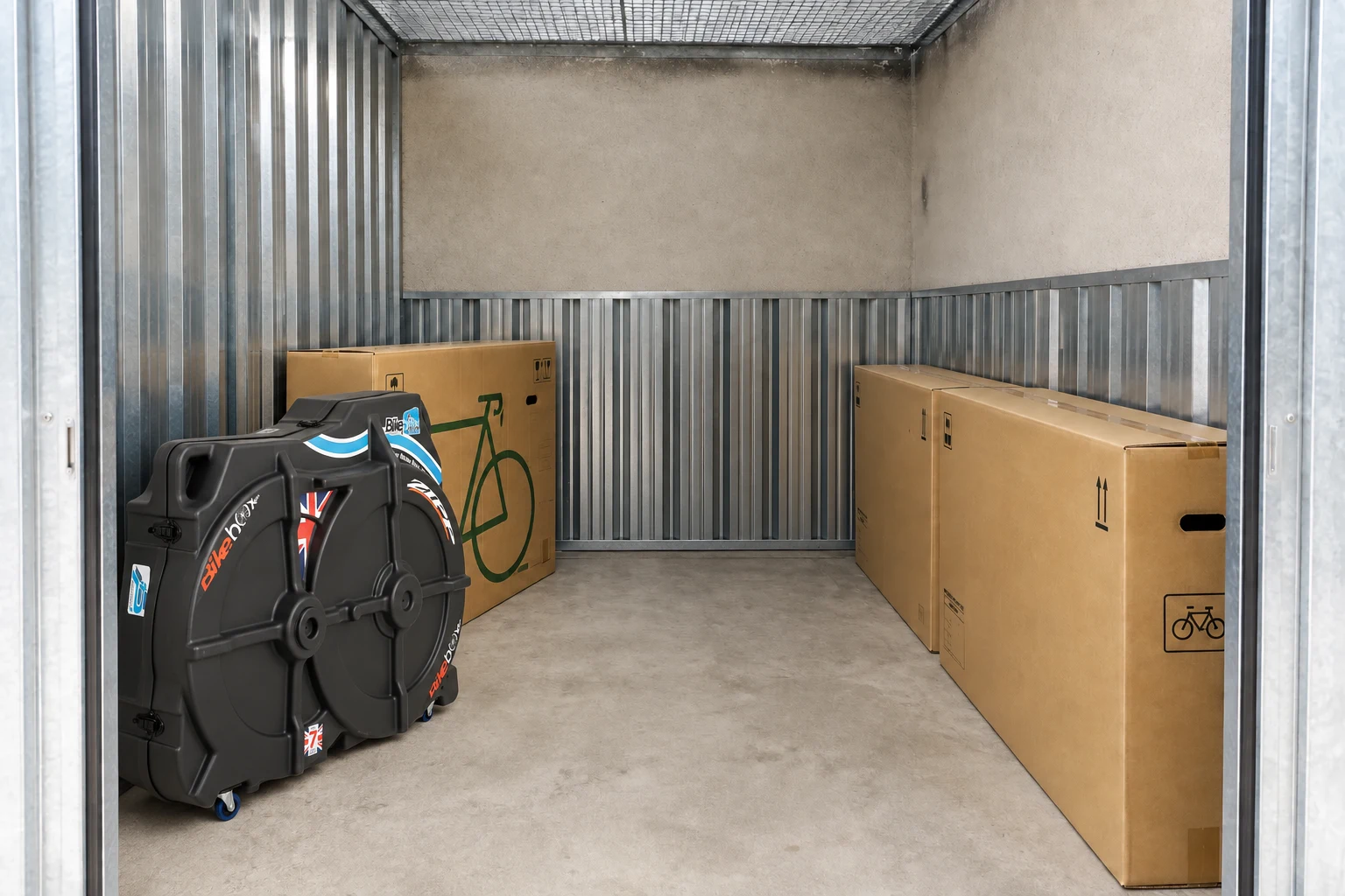 Bike Box Alan Premium Plus bicycle travel bag or case inside a storage unit